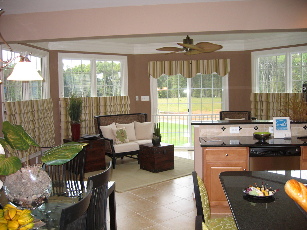 Mid-sized transitional ceramic tile kitchen/dining room combo photo in DC Metro with raised-panel cabinets, light wood cabinets, beige backsplash, ceramic backsplash, an island, brown walls and no fireplace