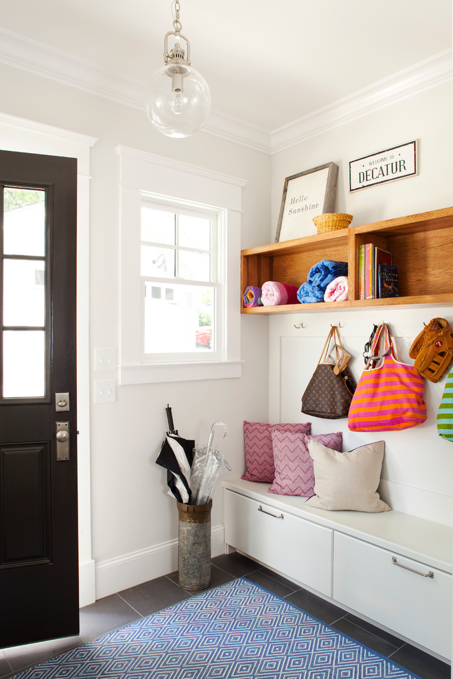 Example of a transitional entryway design in Atlanta with white walls