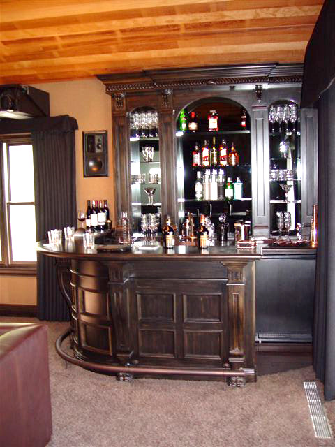 Photo of a traditional home bar in Orange County.
