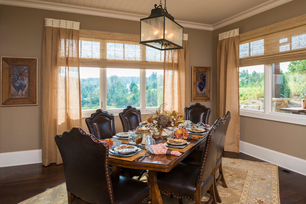 Country dining room in Other with beige walls.