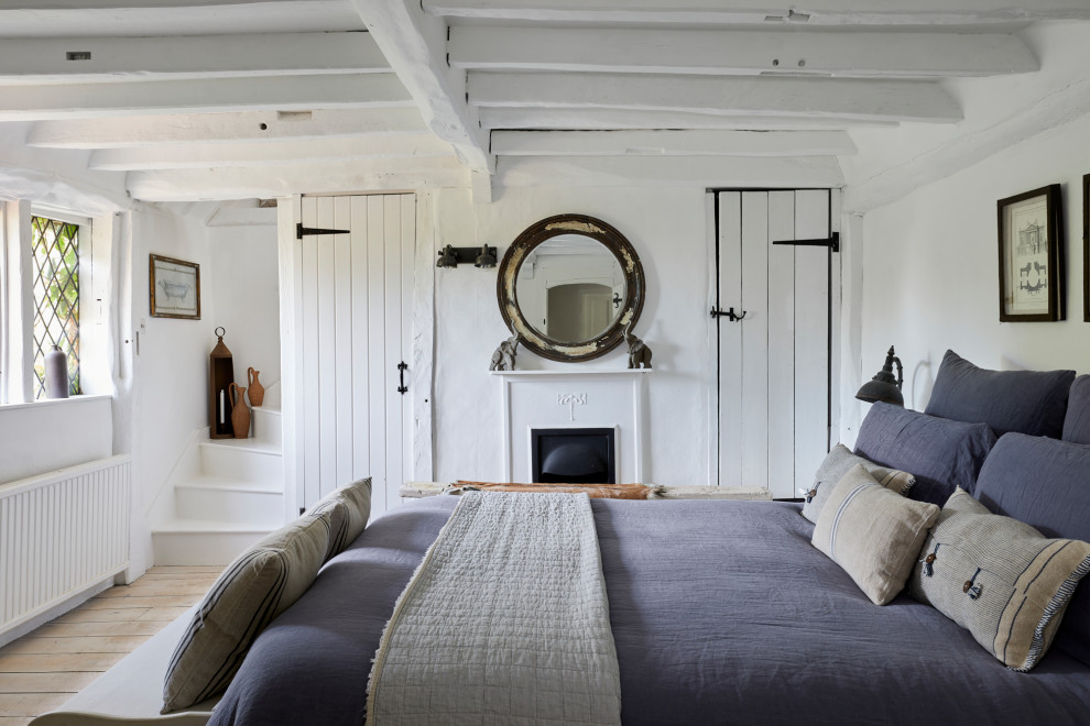 This is an example of a coastal bedroom in London.