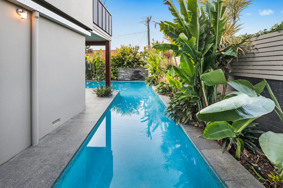Inspiration for a tropical l-shaped pool in Other.