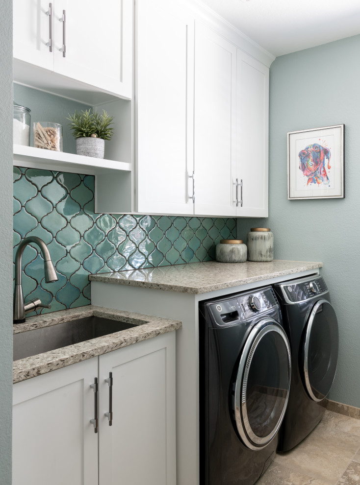 Design ideas for a traditional utility room in Dallas with a submerged sink, shaker cabinets, white cabinets, blue splashback, ceramic splashback, blue walls and a side by side washer and dryer.