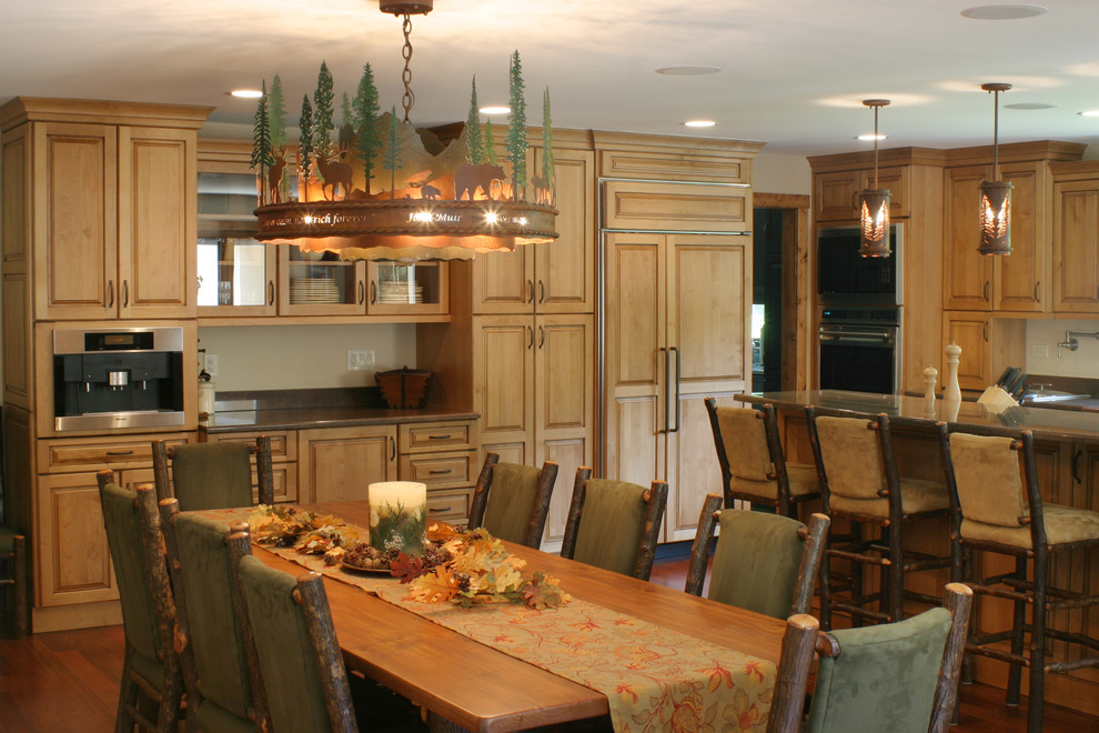 Mid-sized country kitchen/dining combo in Chicago with beige walls, dark hardwood floors and no fireplace.