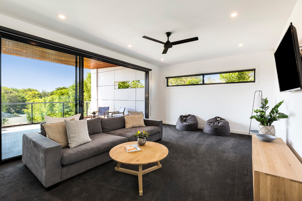 Photo of a modern family room in Melbourne.