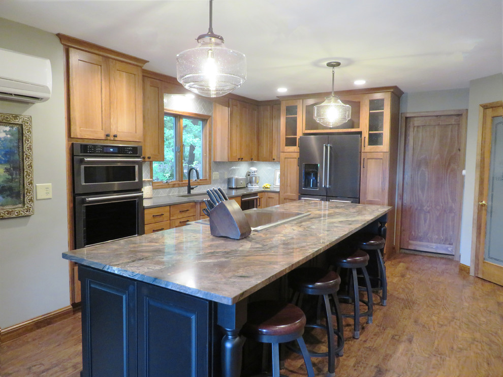 Example of a mountain style kitchen design in Grand Rapids