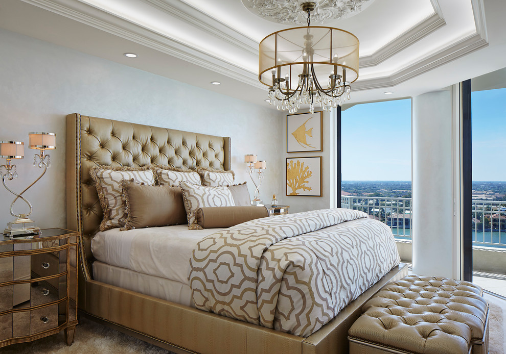 Photo of a traditional bedroom in Miami with white walls, carpet and beige floor.
