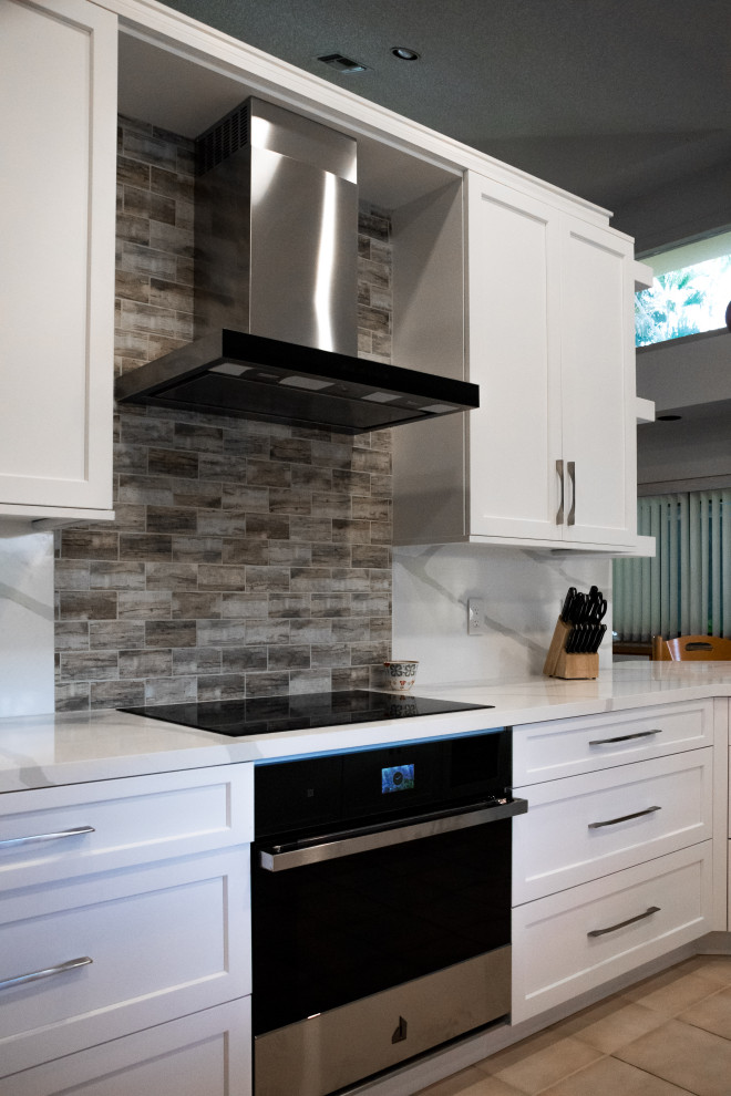 Kitchen - transitional kitchen idea in Miami with shaker cabinets and white cabinets