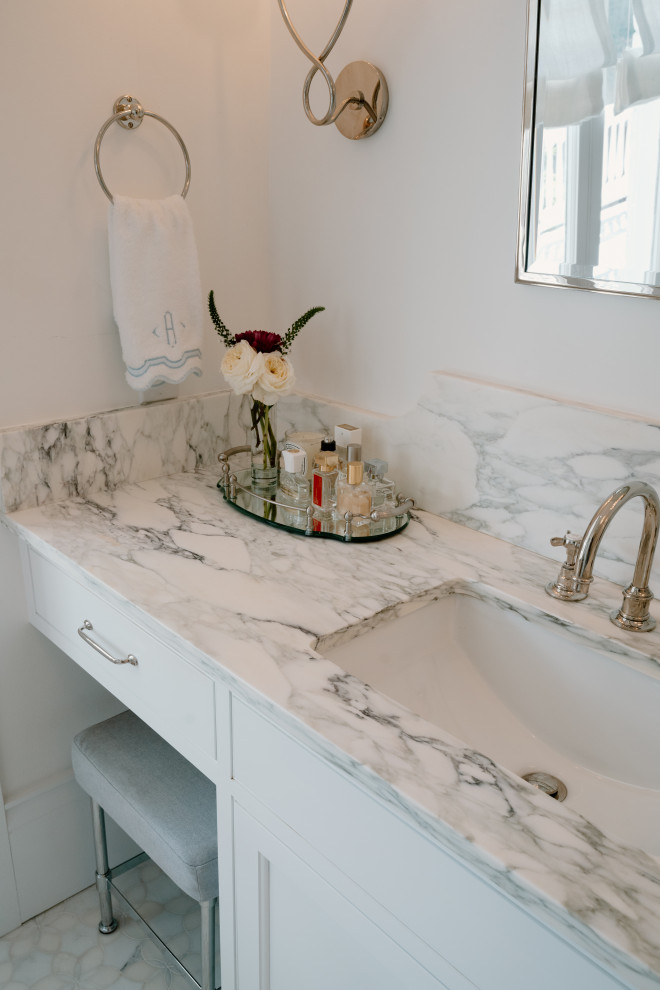 Photo of a mid-sized transitional master bathroom in Charleston with beaded inset cabinets, white cabinets, gray tile, stone tile, white walls, mosaic tile floors, an undermount sink, marble benchtops, multi-coloured floor, a hinged shower door, grey benchtops, a shower seat, a double vanity and a built-in vanity.