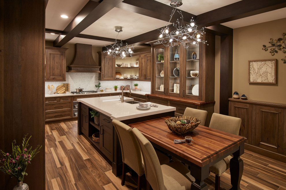 Design ideas for a large traditional u-shaped kitchen in Denver with a farmhouse sink, beaded inset cabinets, dark wood cabinets, quartz benchtops, with island, white benchtop and exposed beam.