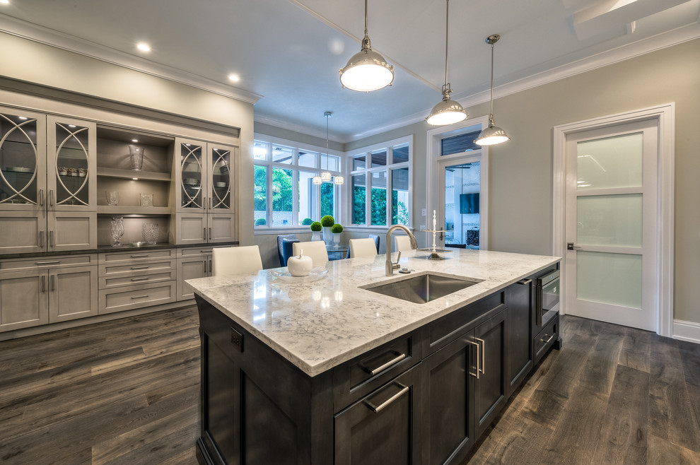 Example of a transitional home design design in Miami