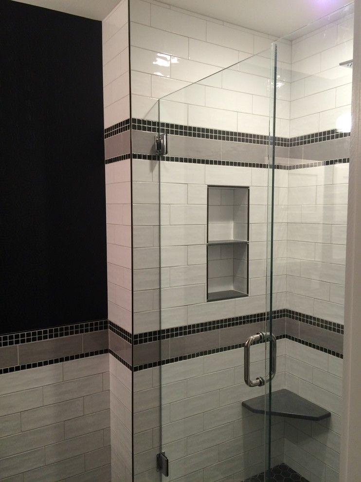 Alcove shower - small transitional master white tile and cement tile porcelain tile alcove shower idea with black walls and an undermount sink