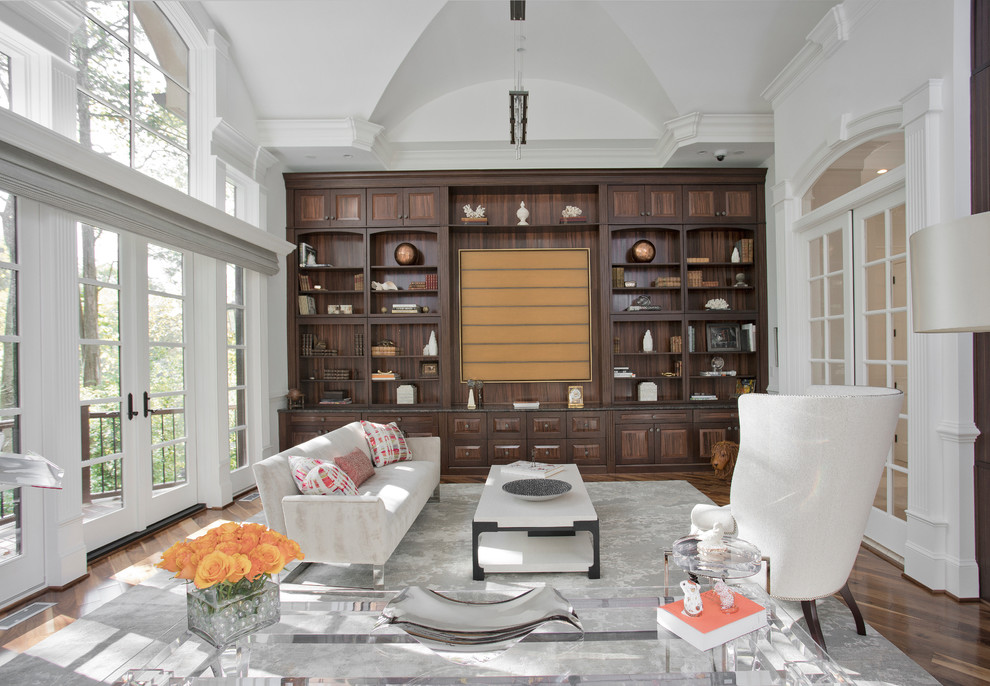 Living room - transitional enclosed dark wood floor and brown floor living room idea in DC Metro with white walls