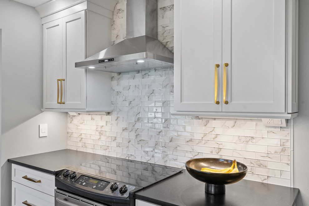 Example of a transitional kitchen design in Boston