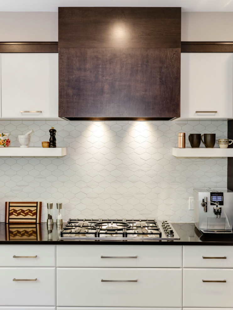 Inspiration for a contemporary kitchen in Ottawa with an integrated sink, flat-panel cabinets, white cabinets, quartz benchtops, white splashback, mosaic tile splashback, with island and white benchtop.