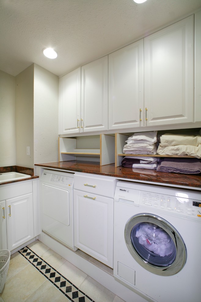 Design ideas for a large contemporary laundry room in Sacramento.