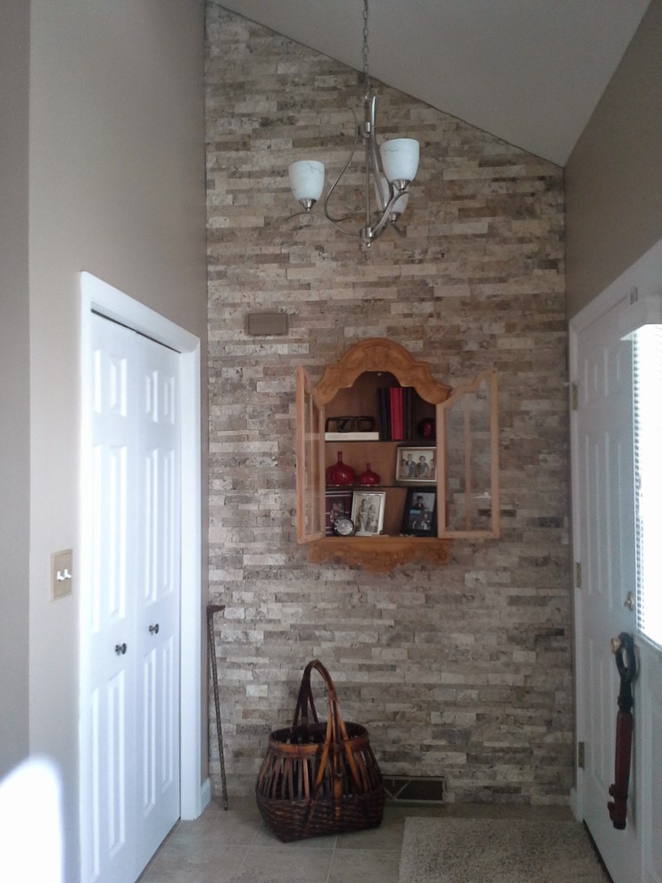 Small transitional foyer in Other with beige walls, linoleum floors, a single front door and a white front door.