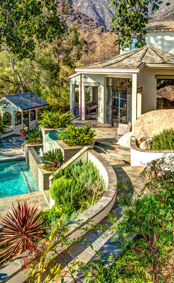 This is an example of a mediterranean partial sun garden in Santa Barbara.