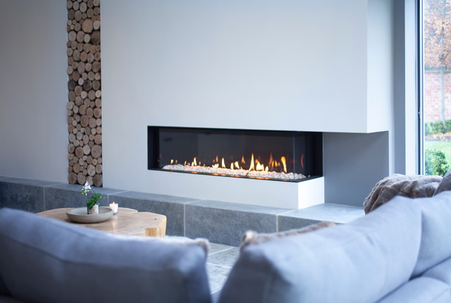 Barn Lounge with Log Stack contemporary-vardagsrum