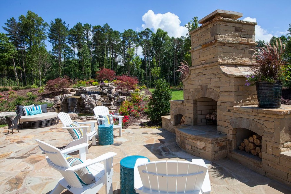 Design ideas for a contemporary patio in Atlanta with a fire feature.