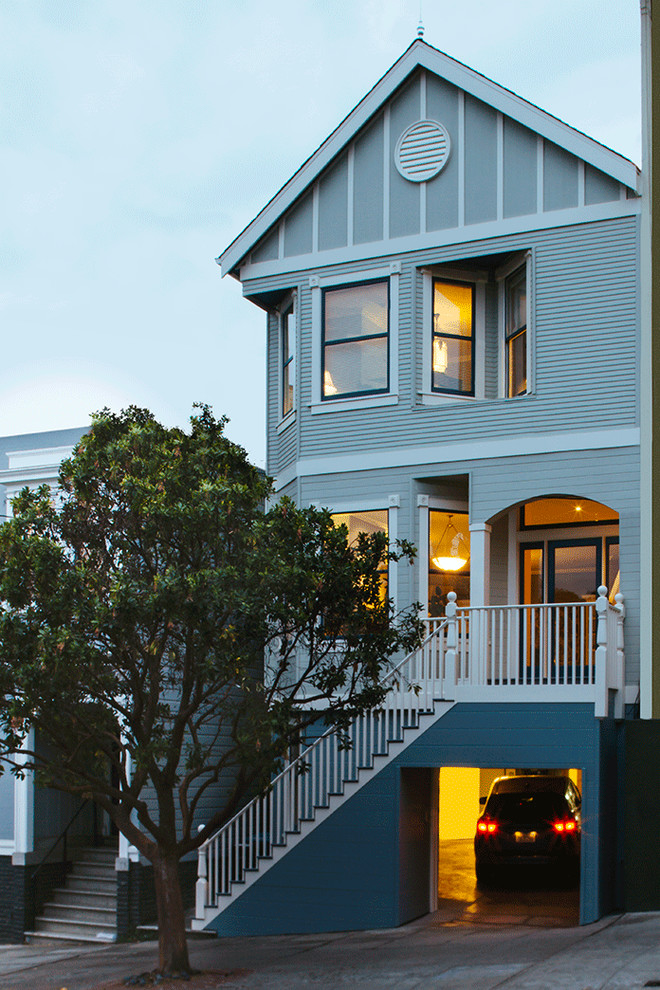 Design ideas for a large traditional three-storey exterior in San Francisco with wood siding and a gable roof.