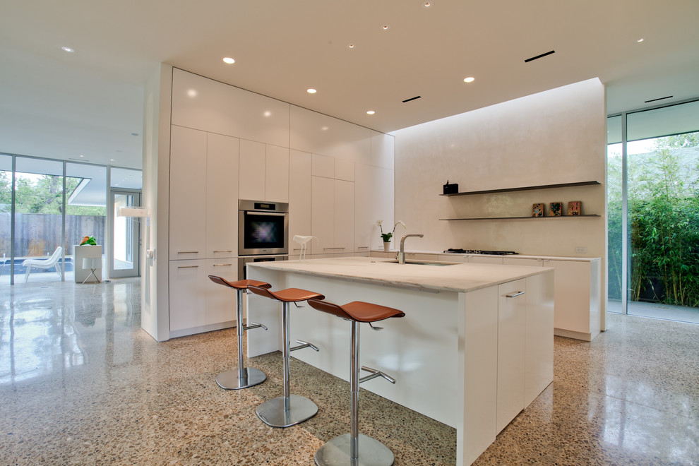Design ideas for a modern kitchen in Albuquerque with marble benchtops.