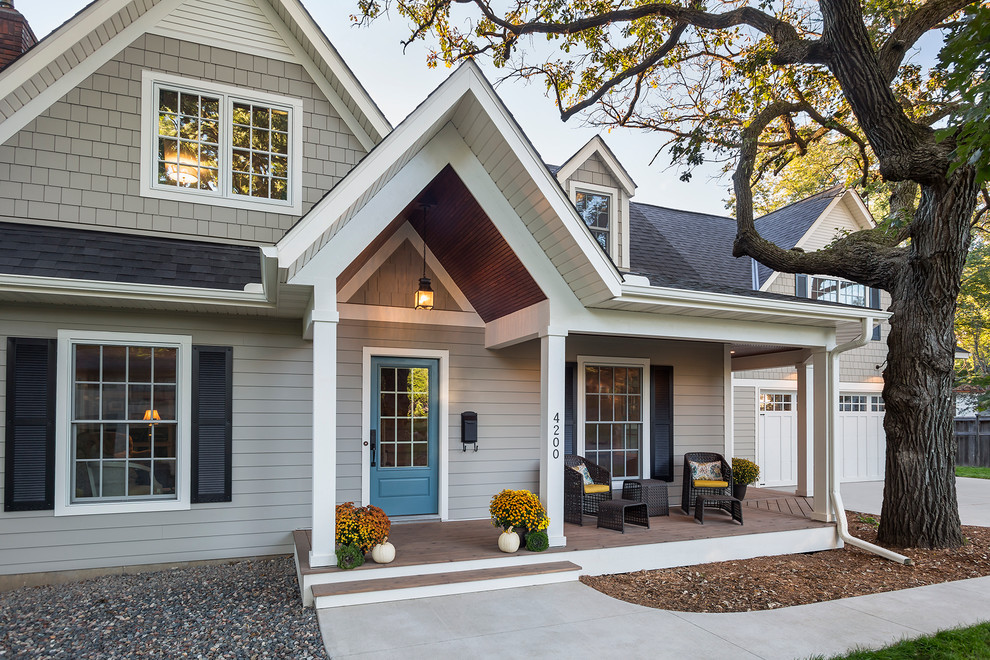 Mid-sized elegant gray two-story concrete fiberboard gable roof photo in Minneapolis