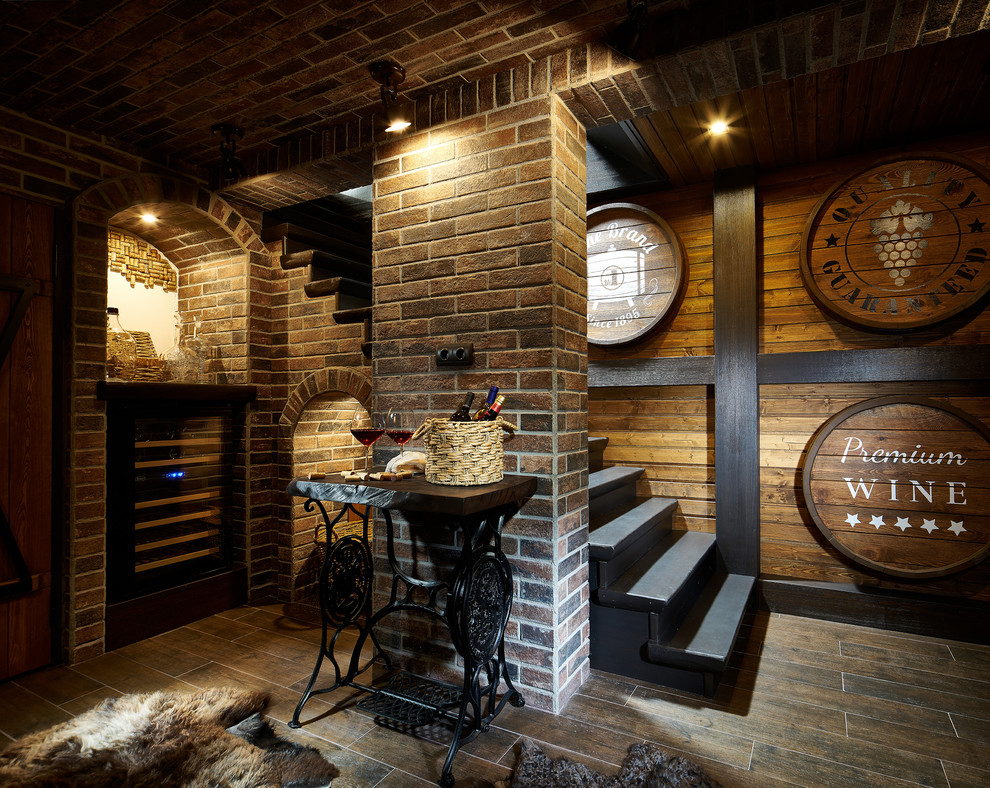 Small country wine cellar in Yekaterinburg with brown floor.