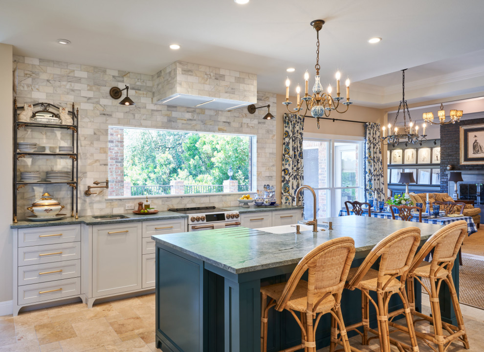 Inspiration for a timeless l-shaped travertine floor kitchen remodel in Austin with beaded inset cabinets, white cabinets, quartzite countertops, an island, green countertops and a farmhouse sink