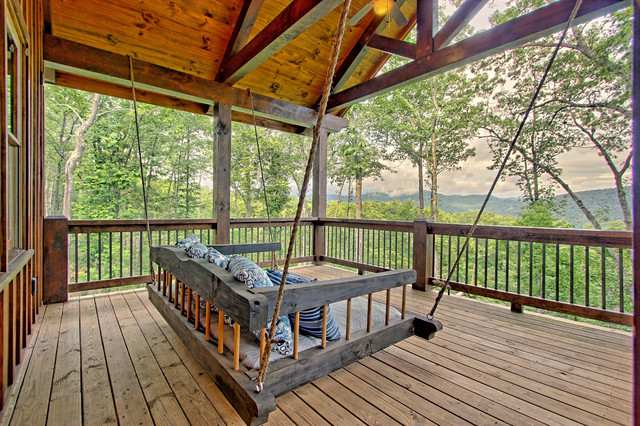 Not Your Average Log Home rustico-terraza-y-balcon