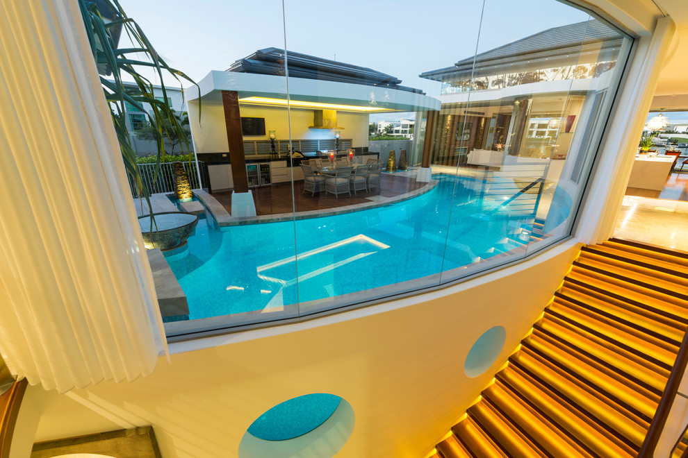 This is an example of a contemporary pool in Gold Coast - Tweed.