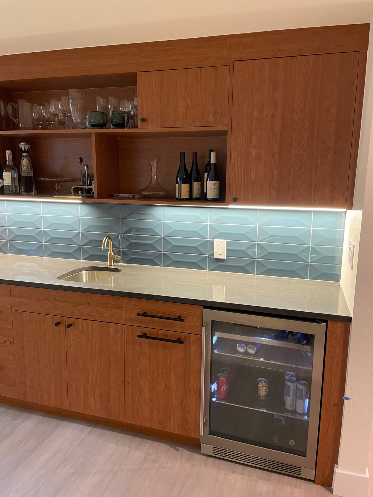 Photo of a large midcentury single-wall wet bar in Denver with open cabinets and medium wood cabinets.