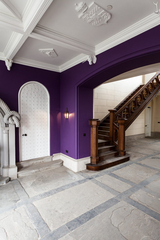 This is an example of a traditional entry hall in Other with purple walls.