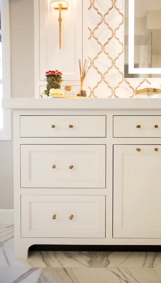 Transitional master white tile and stone tile marble floor home design photo in Phoenix with recessed-panel cabinets, white cabinets, gray walls, an undermount sink and quartz countertops