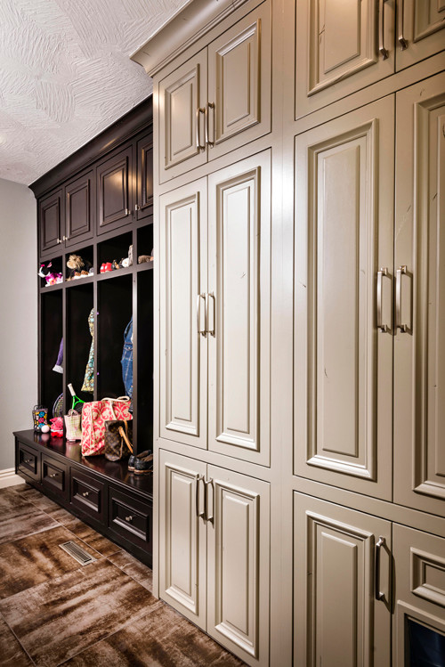 Inspiration for a mid-sized transitional mudroom in Other with grey walls and porcelain floors.