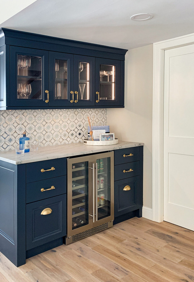 Inspiration for a small single-wall dry bar in Minneapolis with shaker cabinets, blue cabinets, engineered stone countertops, multi-coloured splashback, mosaic tiled splashback and multicoloured worktops.