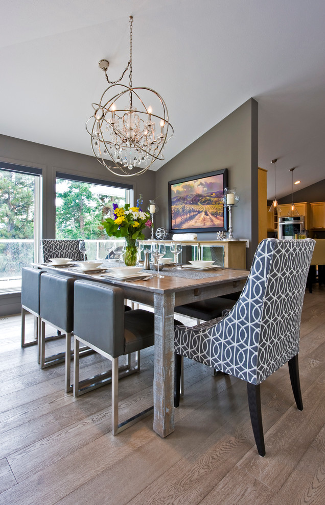 Photo of a contemporary dining room in Vancouver with grey walls and dark hardwood floors.