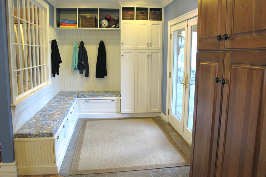 Inspiration for a mid-sized traditional mudroom in Boston with blue walls, ceramic floors, a double front door and a glass front door.