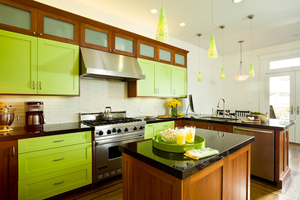 This is an example of an eclectic kitchen in San Francisco with stainless steel appliances.