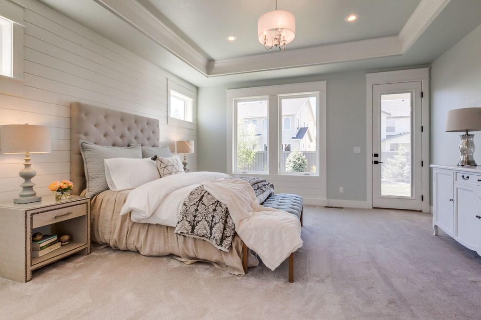 Inspiration for a large transitional master bedroom in Boise with grey walls, carpet, no fireplace and beige floor.