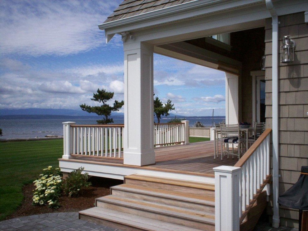 This is an example of a beach style deck in Seattle.