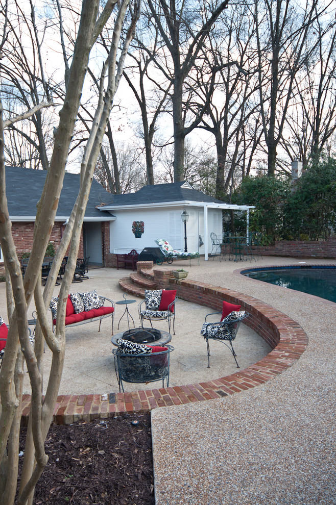 Large backyard kidney-shaped natural pool photo