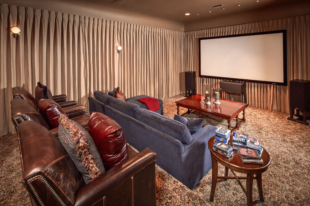 This is an example of a mediterranean home theatre in Houston with a projector screen and multi-coloured floor.