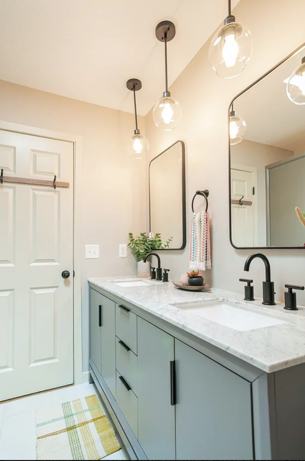 Small scandinavian master bathroom in Minneapolis with flat-panel cabinets, grey cabinets, an alcove tub, a shower/bathtub combo, a one-piece toilet, white tile, ceramic tile, grey walls, ceramic floors, an undermount sink, engineered quartz benchtops, white floor, a shower curtain, white benchtops, a double vanity and a freestanding vanity.