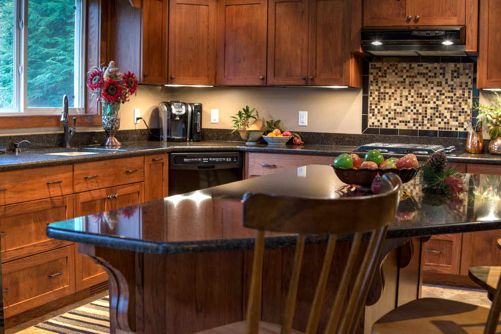 Kitchen - mid-sized rustic l-shaped kitchen idea with an undermount sink, shaker cabinets, light wood cabinets, granite countertops, multicolored backsplash, mosaic tile backsplash, black appliances and an island