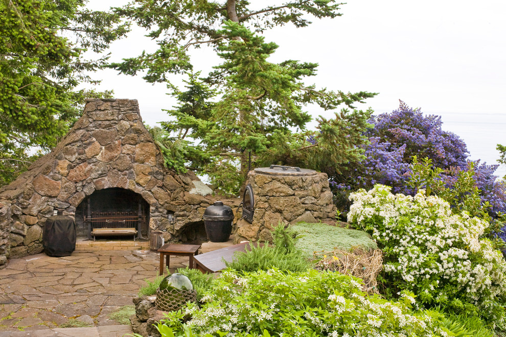 Design ideas for a traditional patio in Seattle with a fire feature.