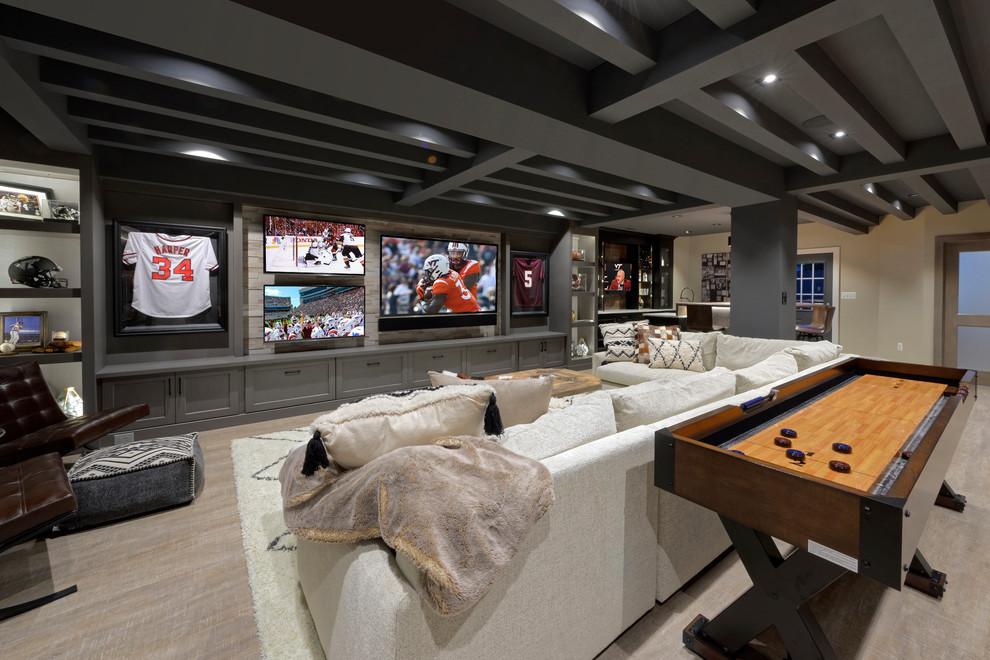 Example of a transitional open concept beige floor game room design in DC Metro with beige walls and a wall-mounted tv