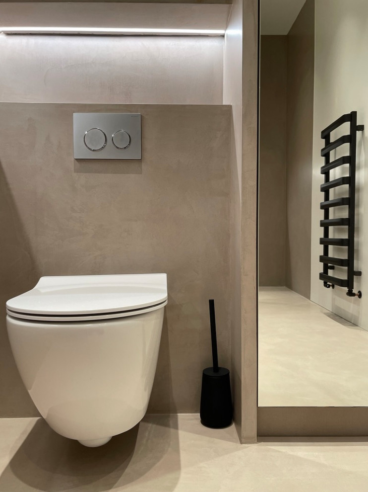 This is an example of a mid-sized modern 3/4 wet room bathroom in London with flat-panel cabinets, brown cabinets, brown walls, concrete floors, a vessel sink, engineered quartz benchtops, brown floor, an open shower, white benchtops, a double vanity and a floating vanity.