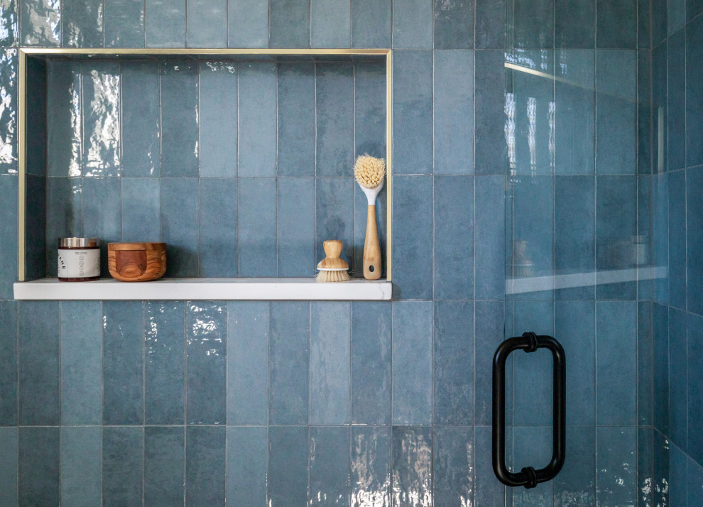 Example of a transitional bathroom design in Denver