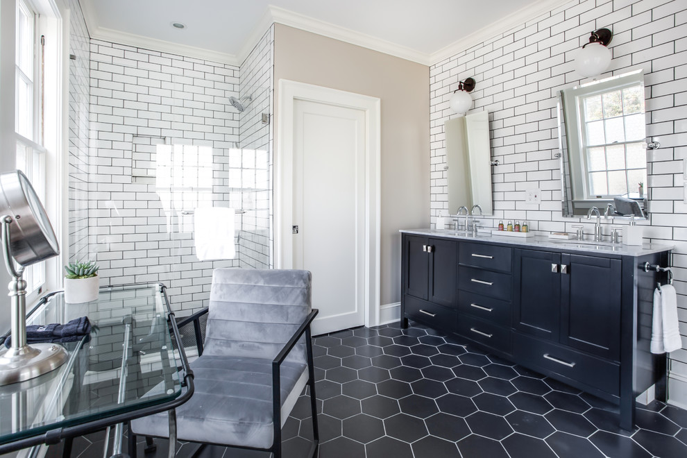This is an example of a transitional bathroom in Atlanta with black cabinets, white tile, subway tile, beige walls, an undermount sink, black floor, grey benchtops and shaker cabinets.